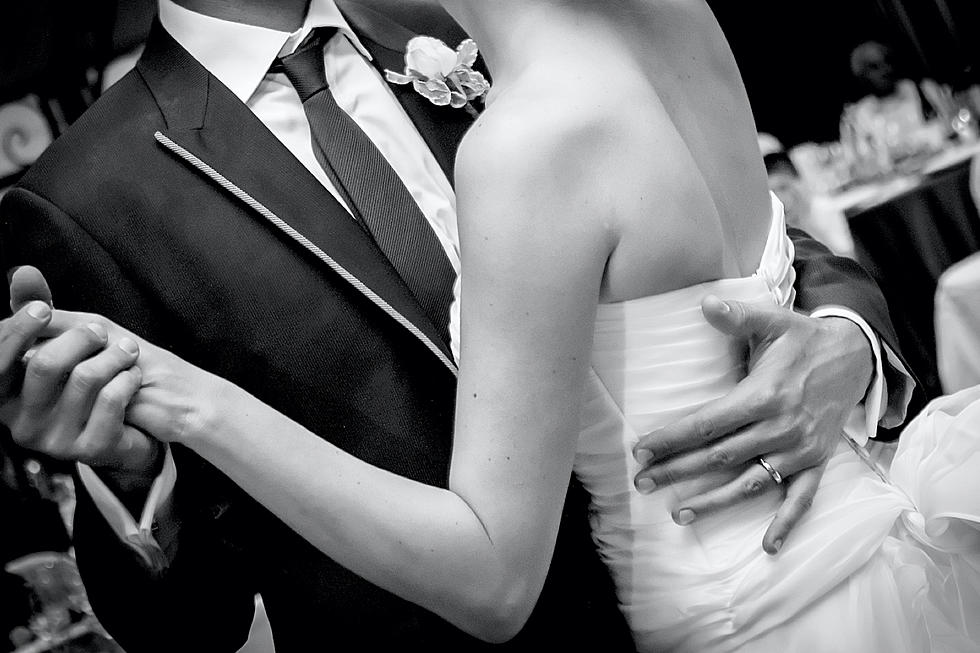 Friend Officiates Couples Wedding From His Fourth-Floor Window