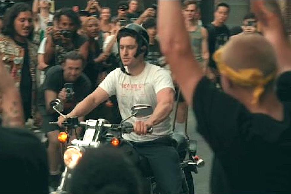 Concertgoer on Motorcycle Cruises Into Mosh Pit at Punk Show