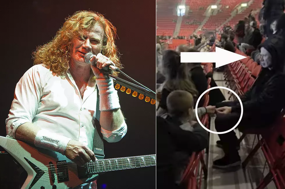 Mustaine Sneaks Into Stands Incognito to Hand Kid Guitar Picks
