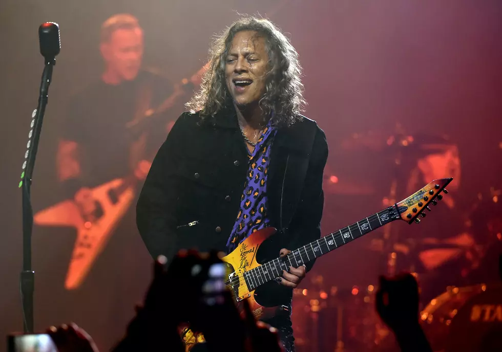 Kirk Hammett performs onstage with bandmate James Hetfield (L) during Metallica's 40th anniversary concert in San Francisco in 2021.