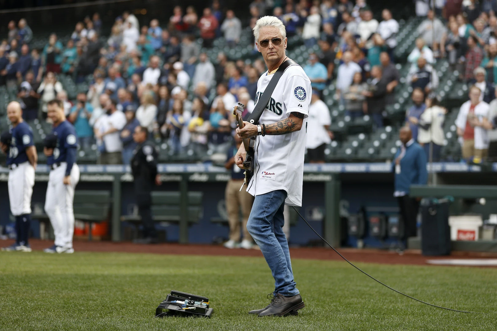 Mike McCready of the rock band Pearl Jam plays the National Anthem