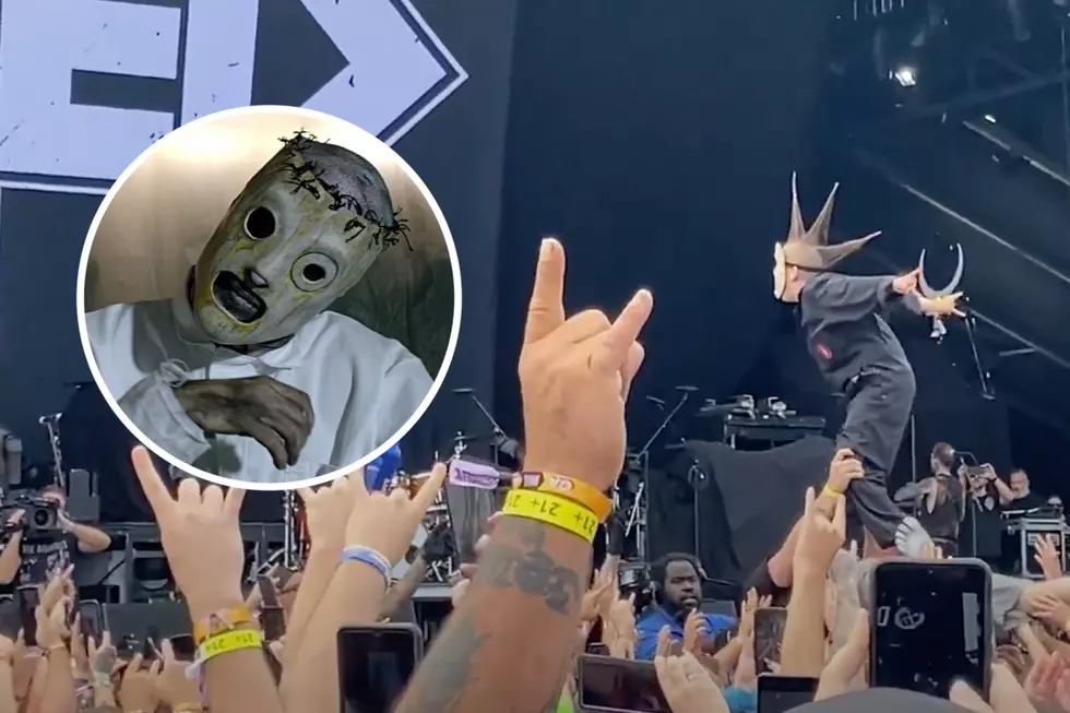Kid in Slipknot Costume Crowd Surfs While Standing on His Dad