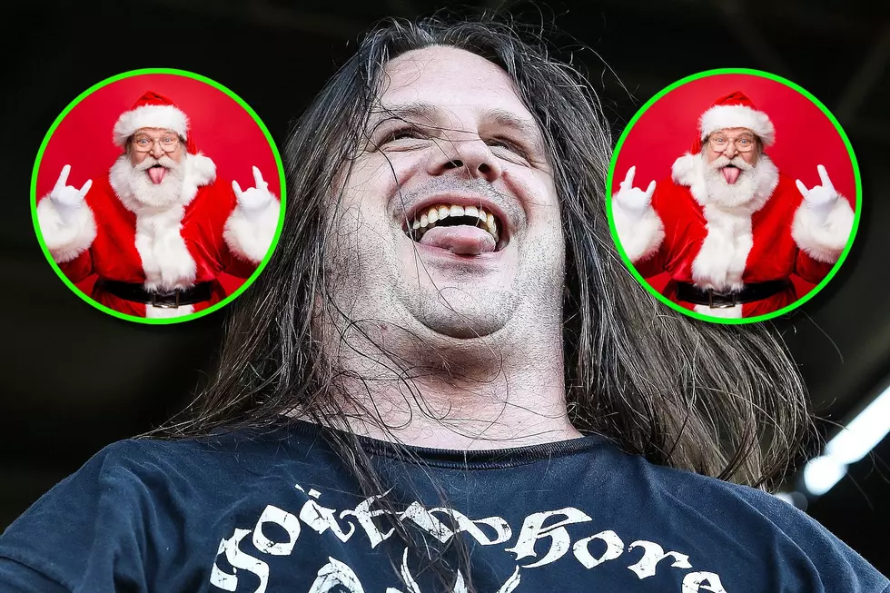 Corpsegrinder Takes Photos With Santa, Donates Stuffed Animals