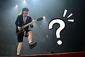 Why Does Angus Young Wear a Schoolboy Uniform in AC/DC?