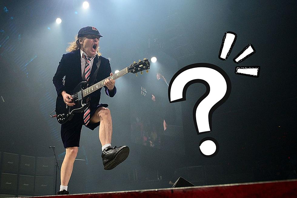 Why Does AC/DC's Angus Young Wear a Schoolboy Uniform?