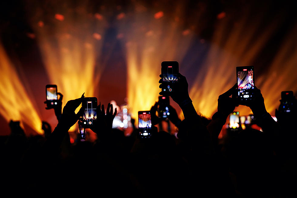 Fans Debate When Filming a Concert on the Phone Goes Too Far