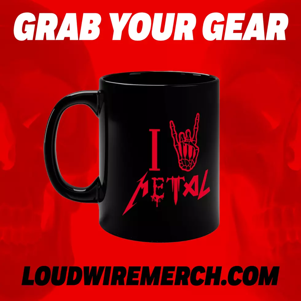A mug from the Loudwire merch store with the design I 'Horns' Metal, showing a skeleton hand making the metal horns gesture