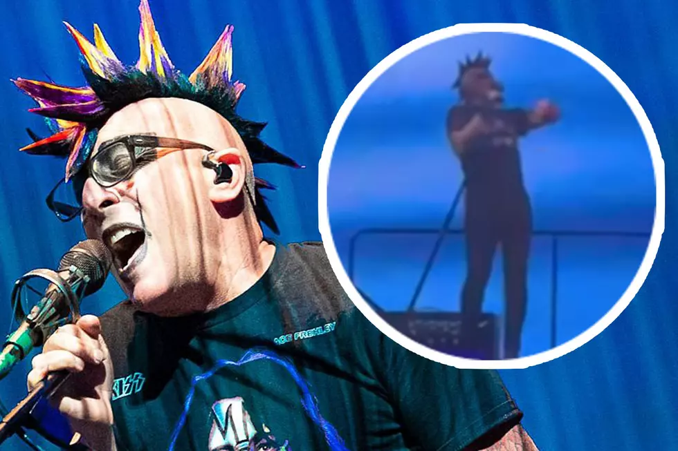 Why Does Maynard James Keenan Sing From Back of the Stage With Tool?
