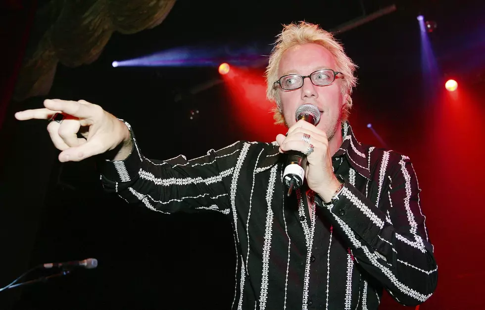 jani lane of warrant performs on stage.