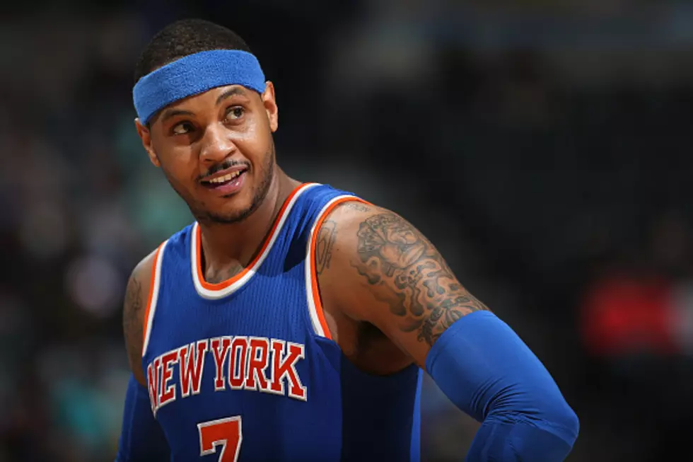 Young Fan Runs On Court To Hug Carmelo Anthony