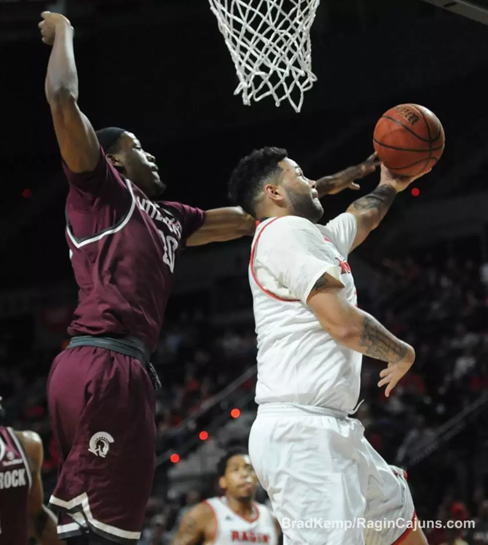 Louisiana Holds Off Little Rock To Survive And Advance