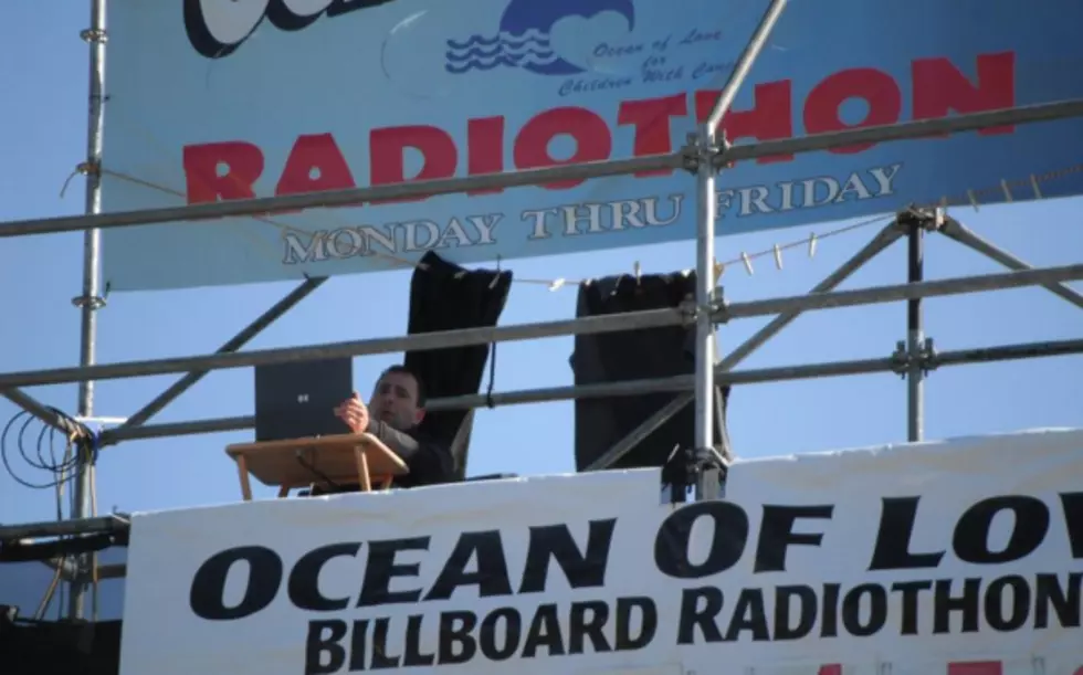 Would you spend a week living on a billboard?