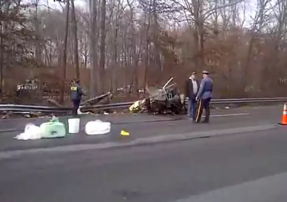 Crews Gather Wreckage of Highway Plane Crash [VIDEO]