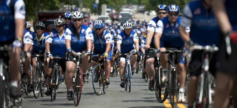 Police Unity Tour Riders Bicycle Through Newark