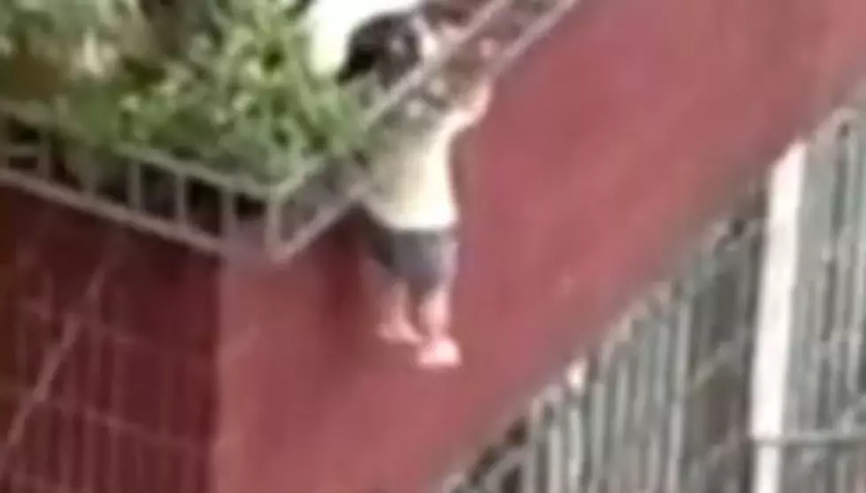 Toddler Dangling From Four Story Building [VIDEO]