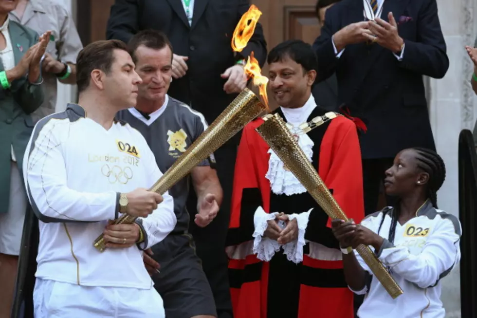 Olympic Torch Visits London Landmarks [VIDEO]