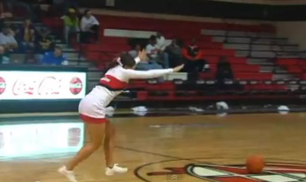 College Cheerleader Sinks Front-Flip Half-Court Shot [VIDEO]