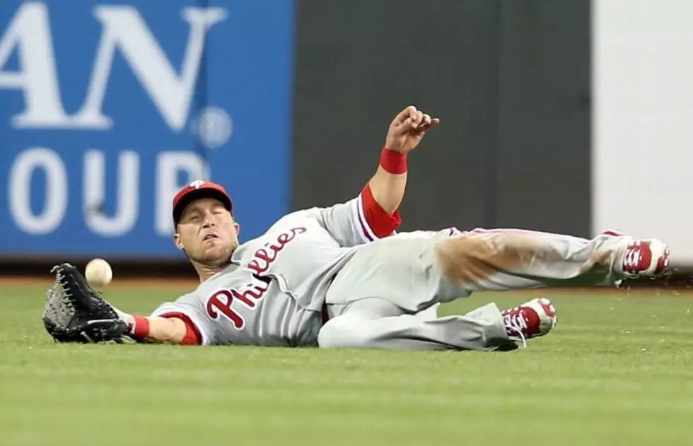 Late Rally Dooms Phillies Against Reds