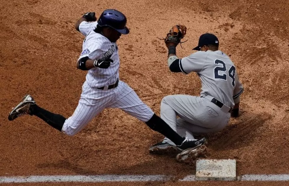 Cano Leads Yankees Over Rockies