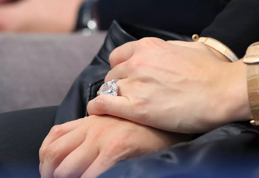 NJ Airman Proposes to Girlfriend at Cheerleading Competition [VIDEO]