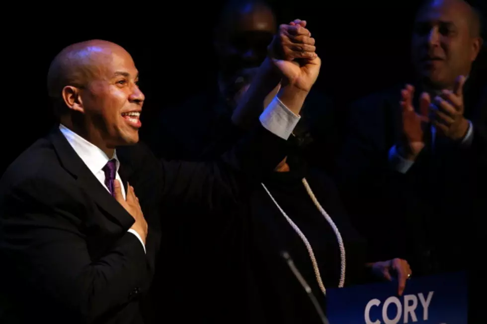 Booker made $500k in 2013, documents say