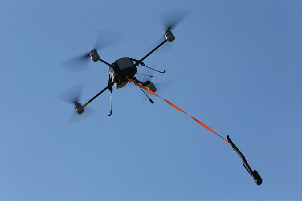 Drone Pilot Attacked by Crazed Female Beachgoer