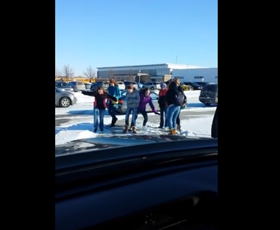 Father Watches Kids Take Spills on the Ice [VIDEO]