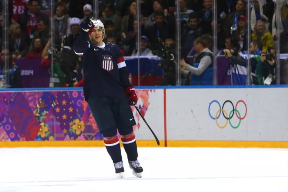 US Shootout Goals Beat Russia in Hockey
