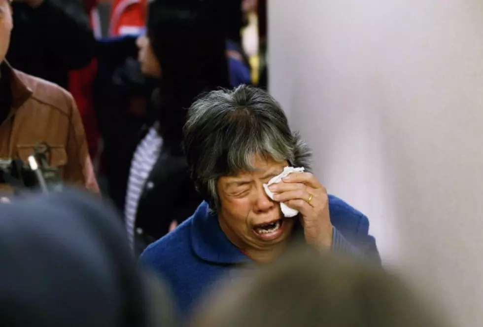 Relatives Sob as Malaysia Confirms Plane is Lost