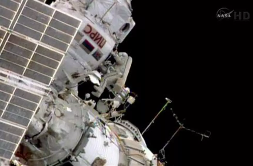 Spacewalking astronauts tackle station chores
