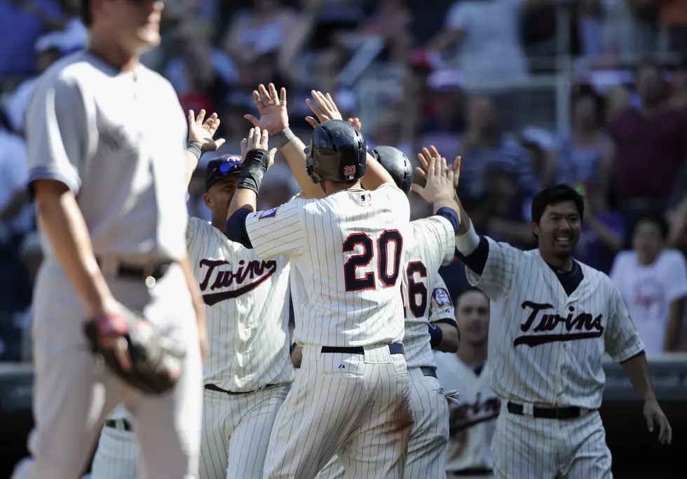 Cervelli makes error in 11th, gives Twins win