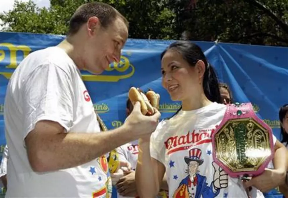 Joey Chestnut keeps hot dog title, gets engaged