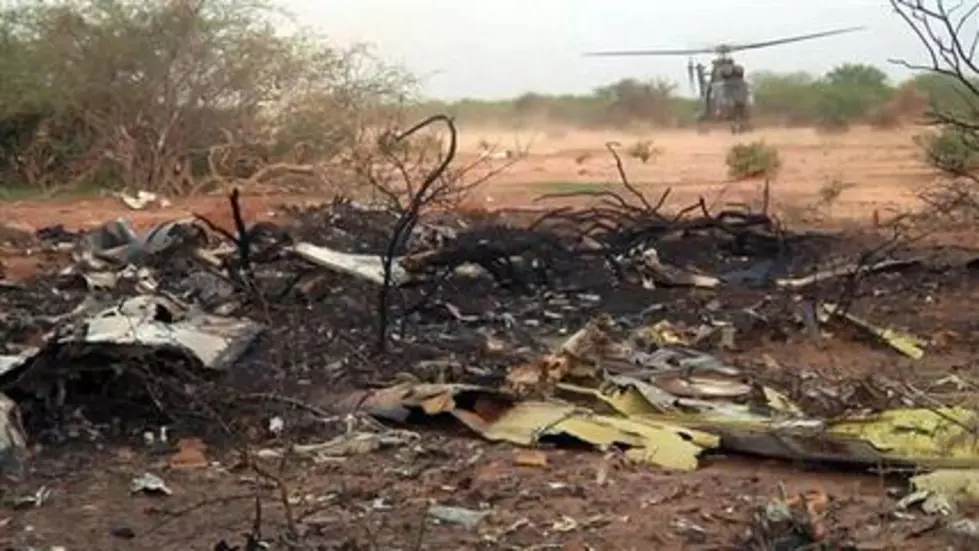 Teams converge on remote site to probe plane crash