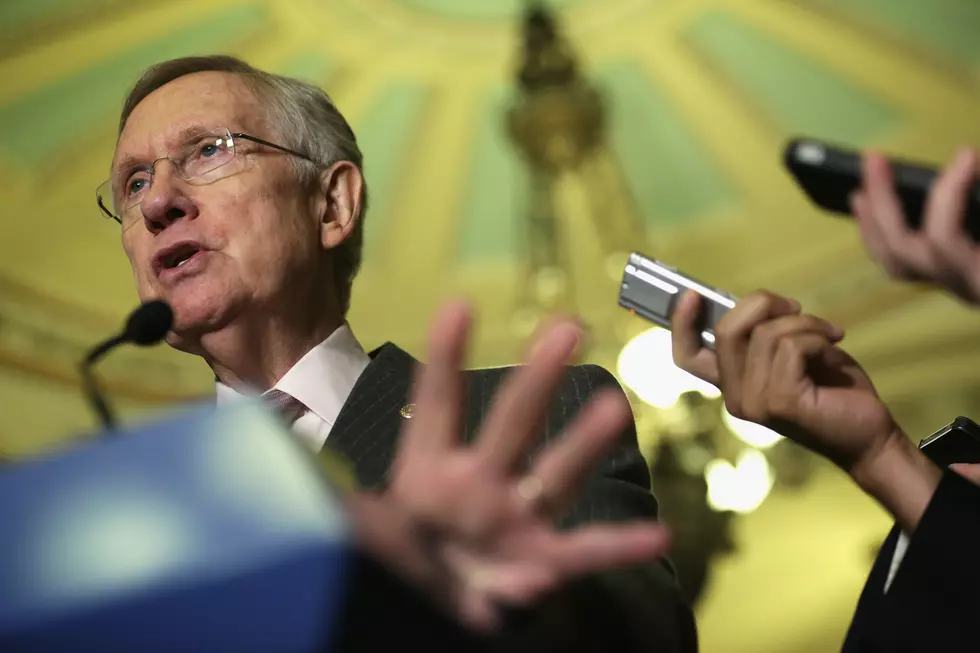 Reid met by protesters at NJ event