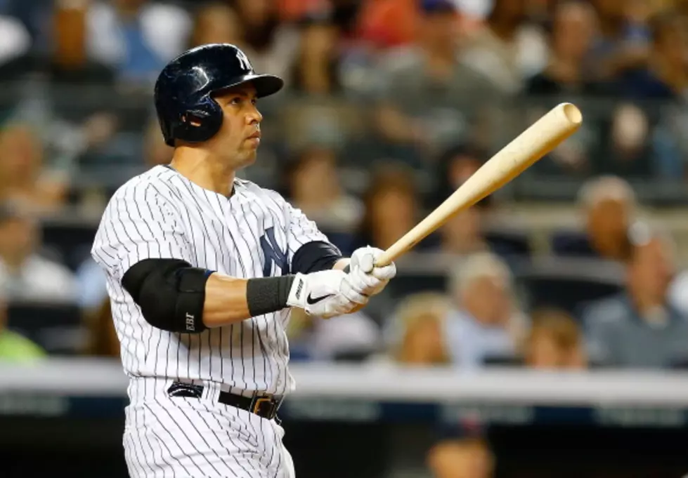 Beltran hits grand slam, Rogers solid in Yankee win