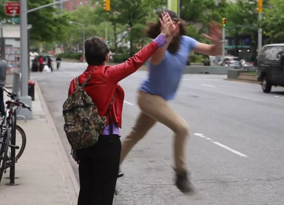 WATCH: Bearded man high-fives New Yorkers hailing cabs