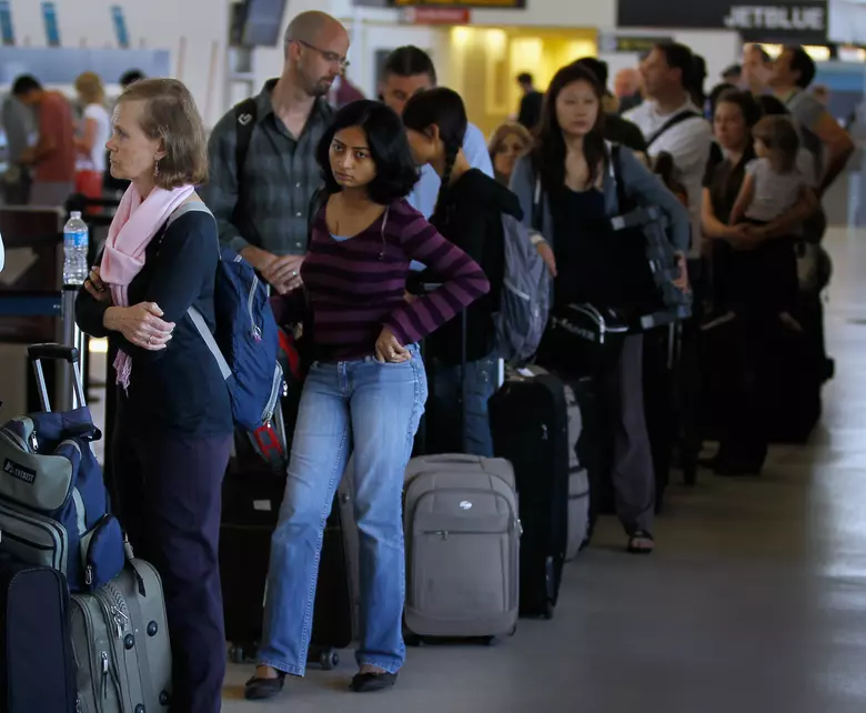 Travelers at Newark Liberty International Airport