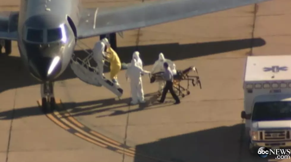 Who is the &#8216;Clipboard Guy&#8217; at the Ebola patient transfer?