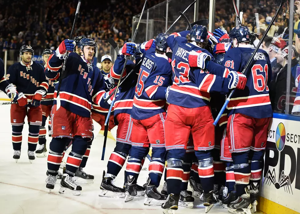 Rangers edge Red Wings in OT