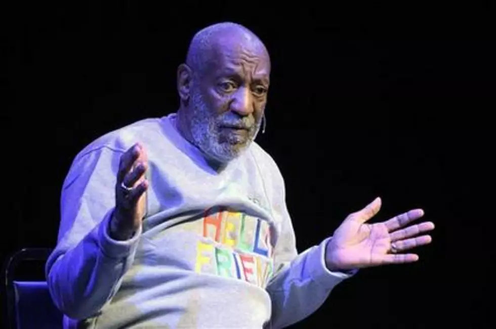 Woman sues Cosby, claims underage abuse
