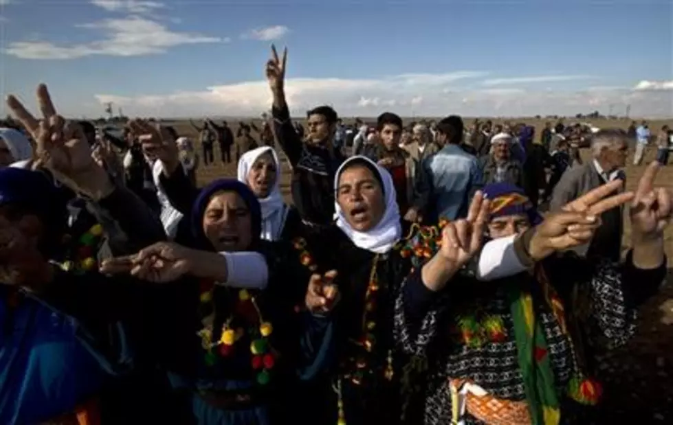 Kurds in Turkey rally to back city besieged by ISIS