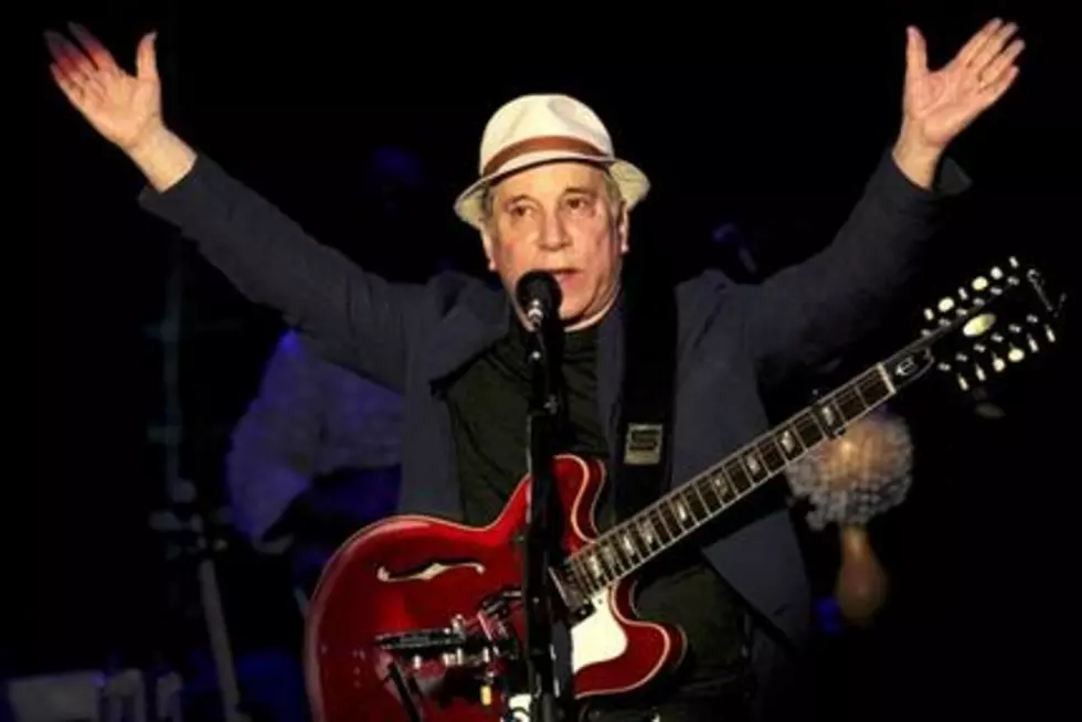 Paul Simon cooperating for planned biography