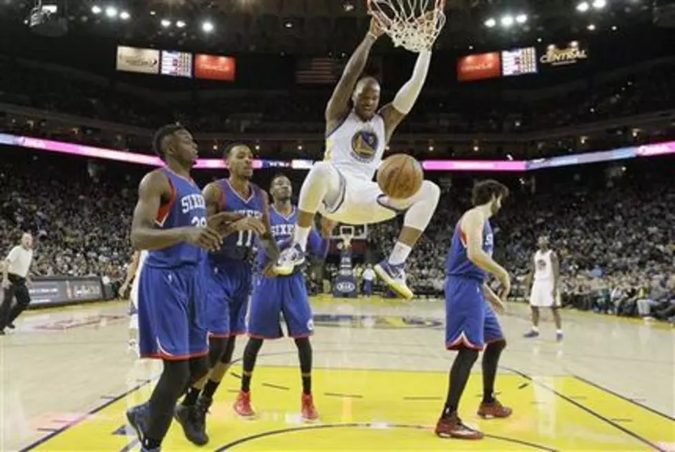 Warriors keep rolling, topple 76ers 126-86