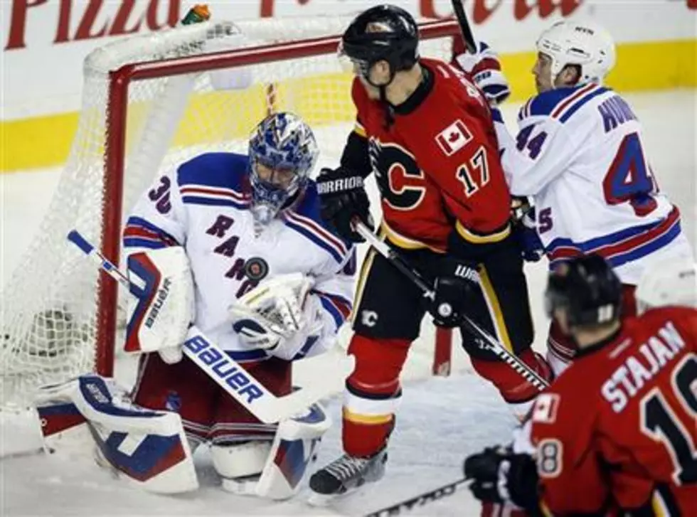 Nash scores twice to reach 20; Rangers top Flames