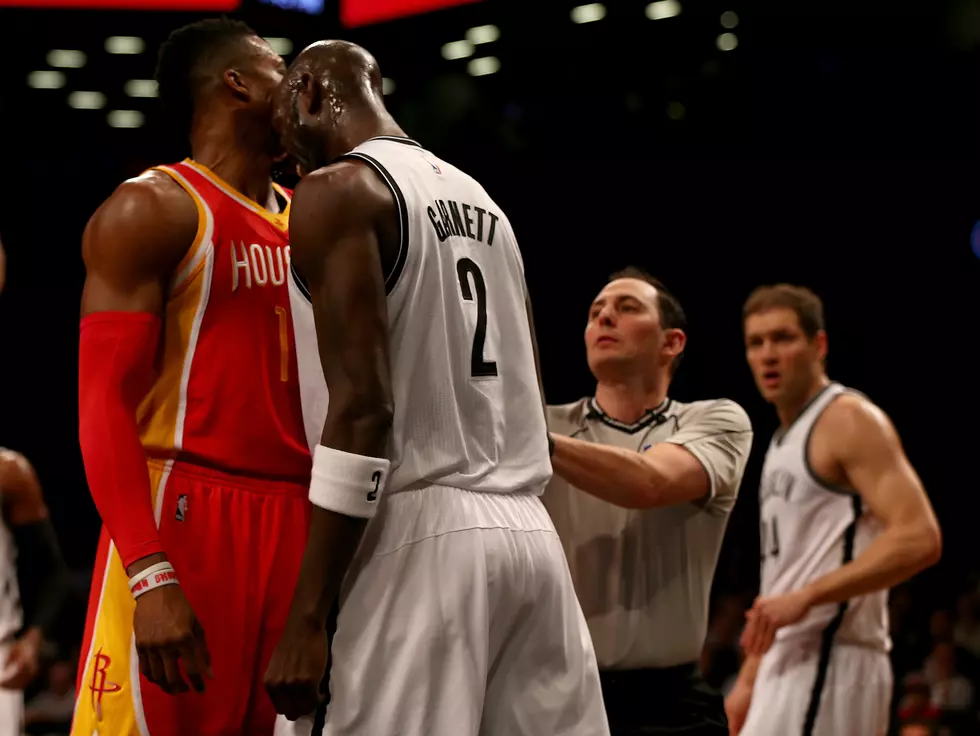 Rockets beat Nets; Garnett, Howard fight