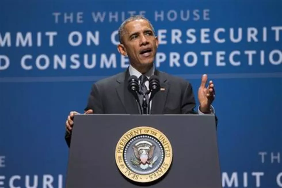 Obama calls for public debate over encryption
