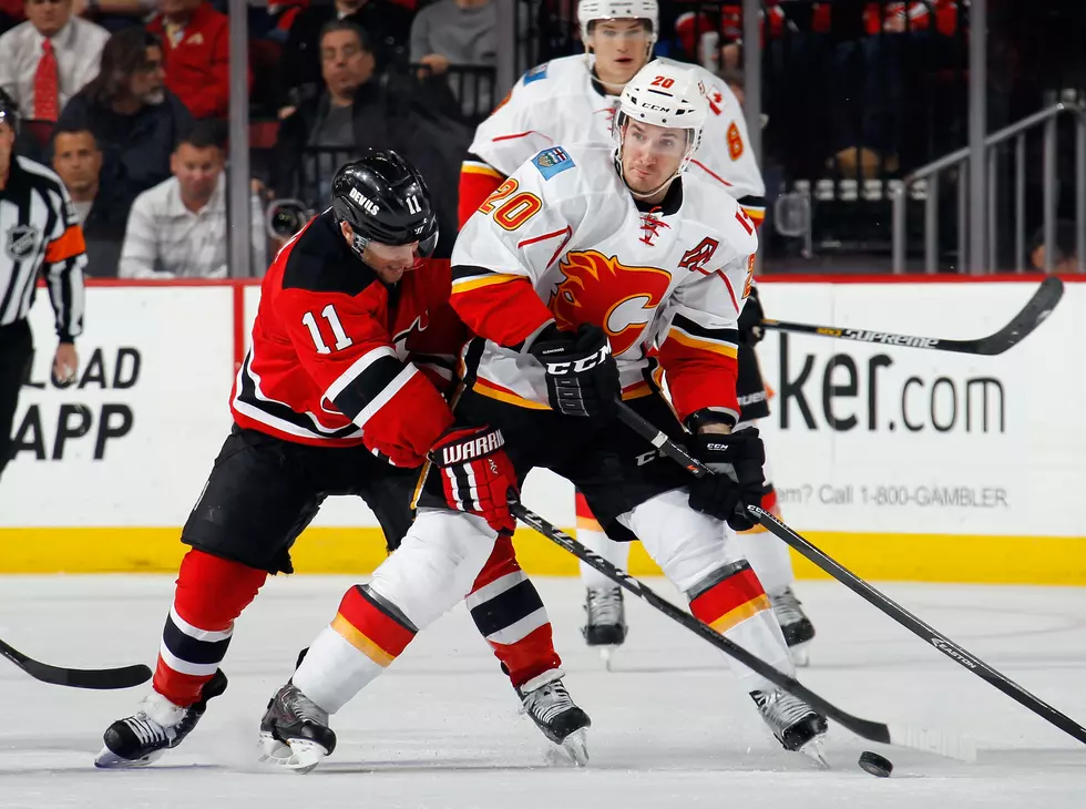Devils falter late, lose to Flames