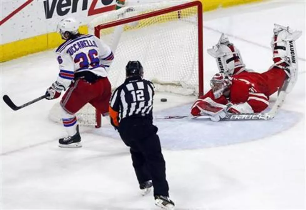 Rangers hold off Hurricanes, win 3-2 in SO