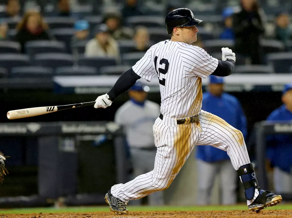 Yankees rally in 8th for first win