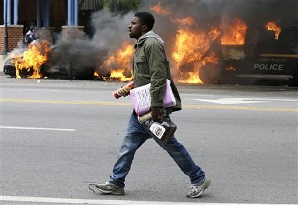 Major riot erupts in Baltimore after funeral for man hurt in police custody